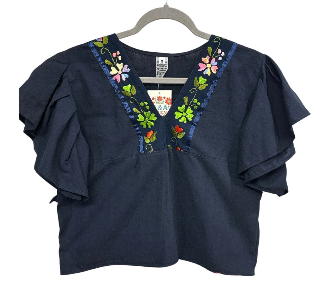Blusa Artesanal con bordado en el cuello.